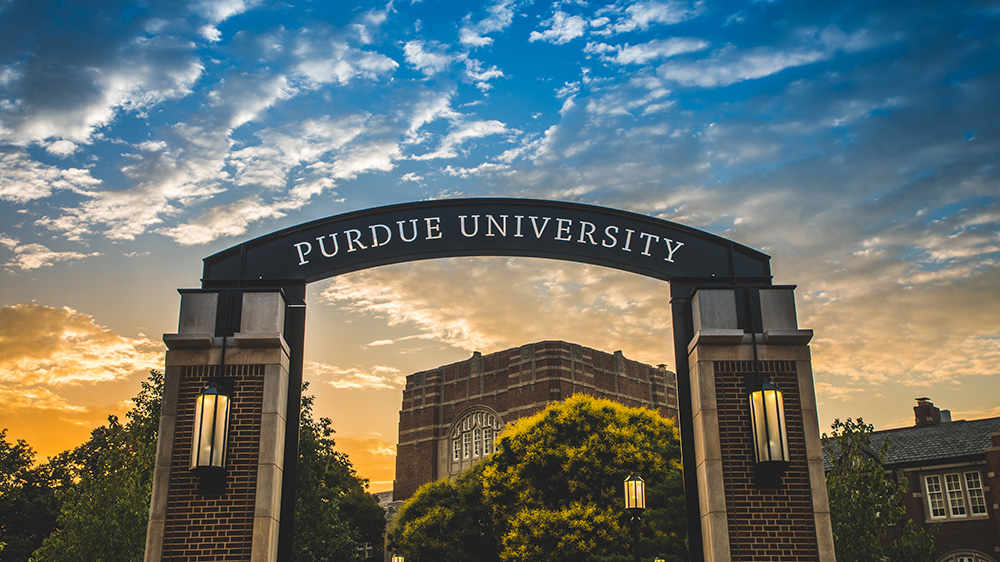 Purdue University Gateway Arch with the sun setting behind it