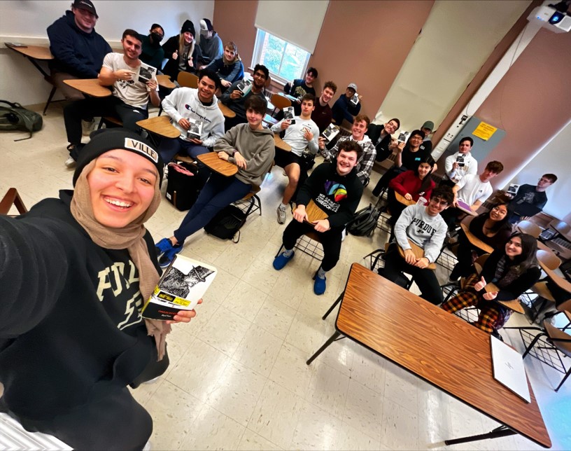 Students take a selfie in class.