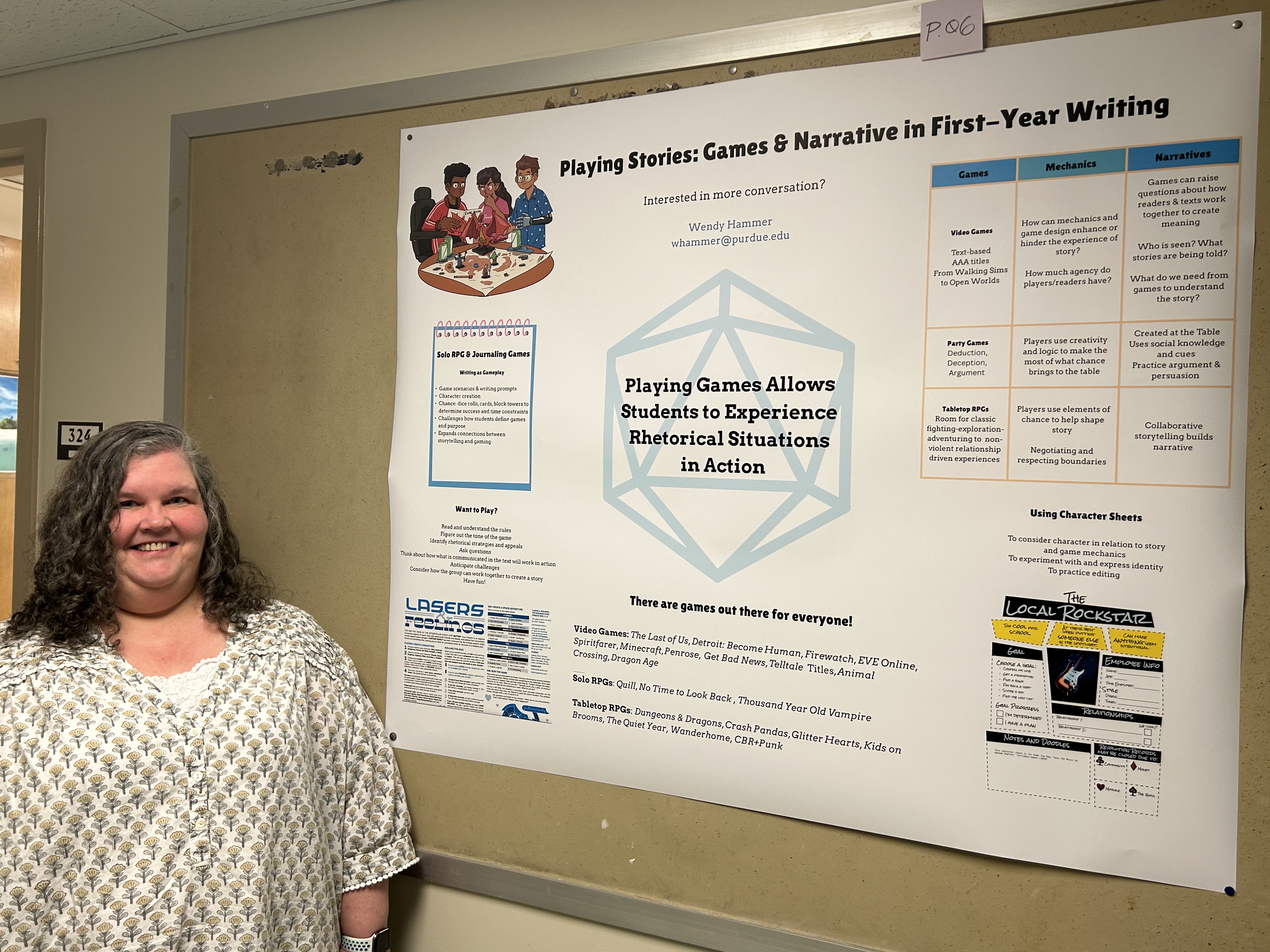 Wendy Hammer standing next to her research poster.