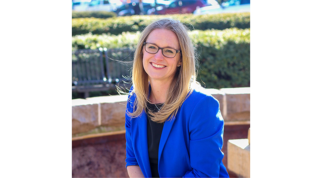 Dr. Katie Brownell sitting outside 