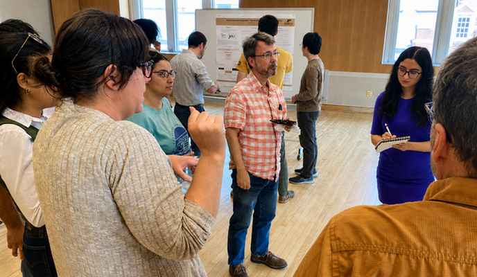 faculty and students at the second-yr student poster session