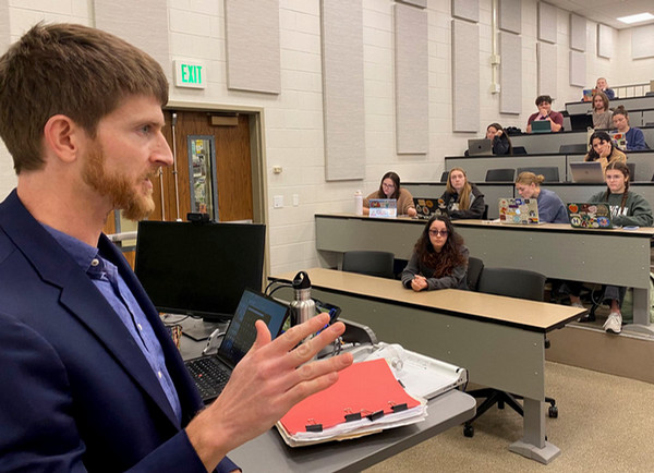 Reed Kurtz lecturing to a class of students