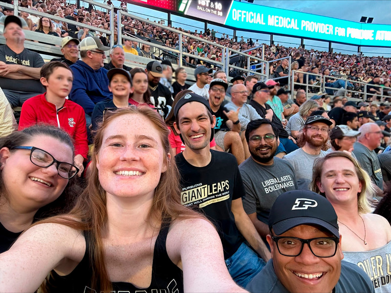 Grad students at a Purdue football game