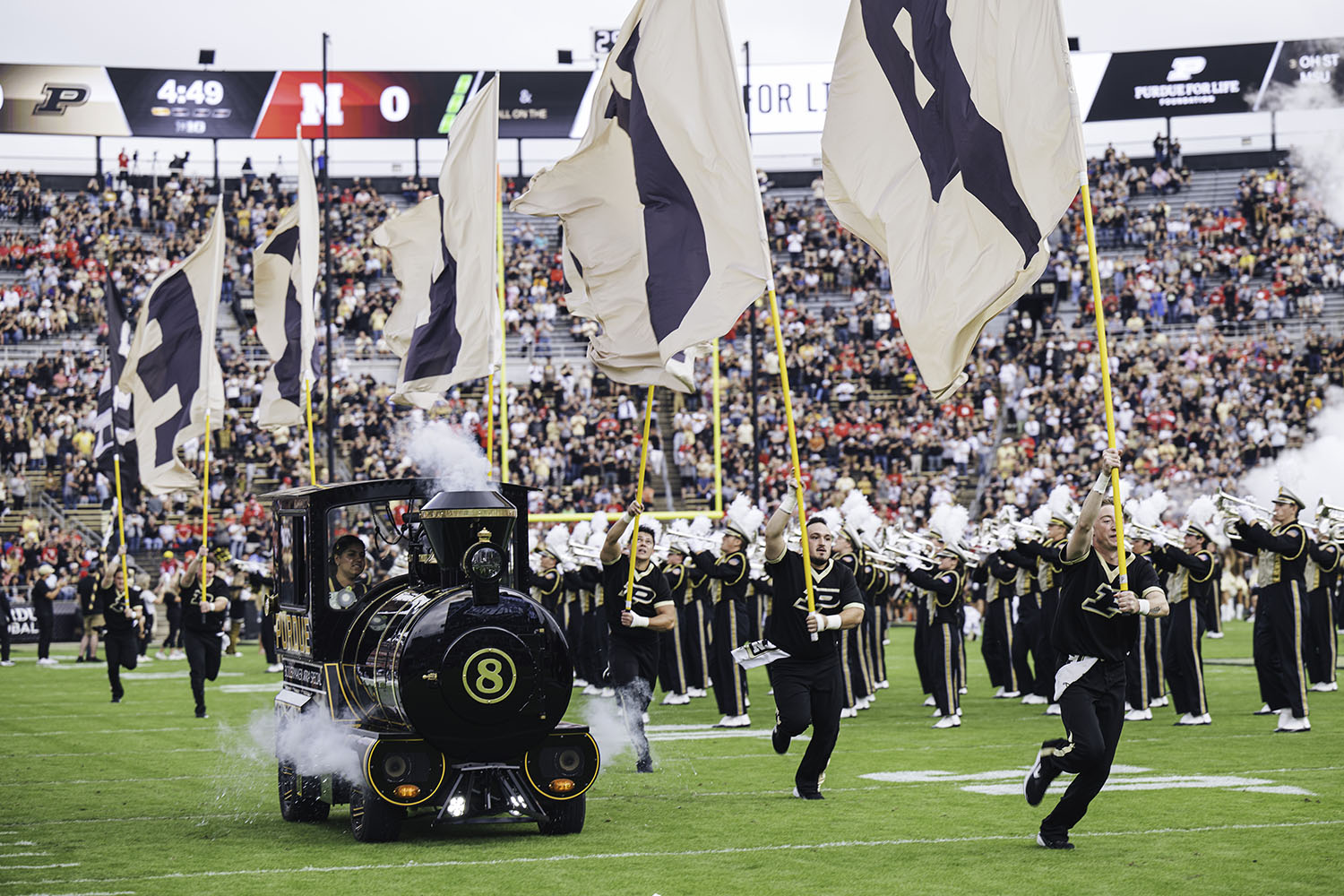 Purdue students and band at a football game