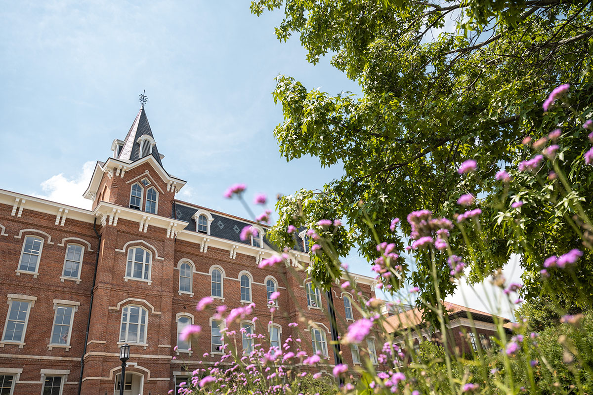 University Hall with flowers in the foreground