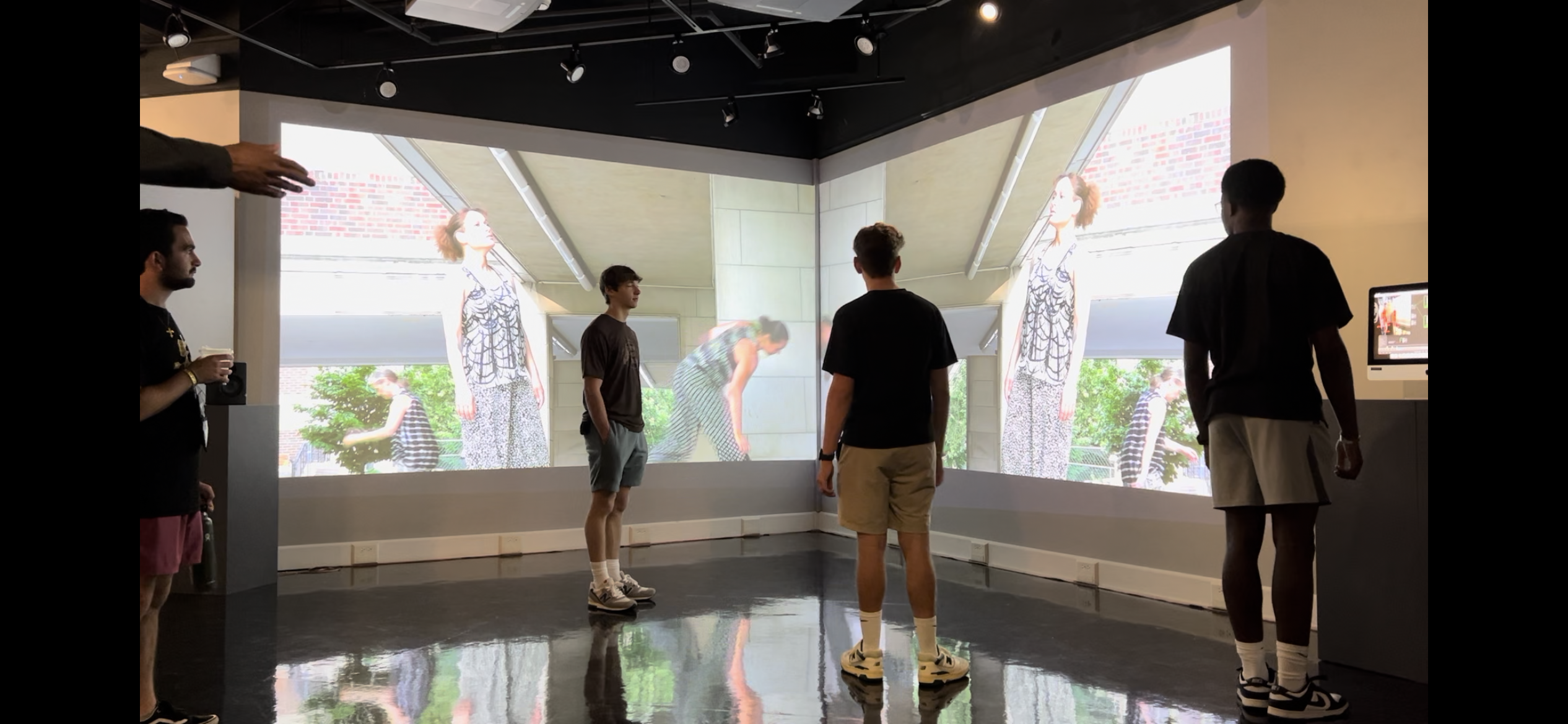 Students interact with the In Motion exhibit in the Ringel Gallery