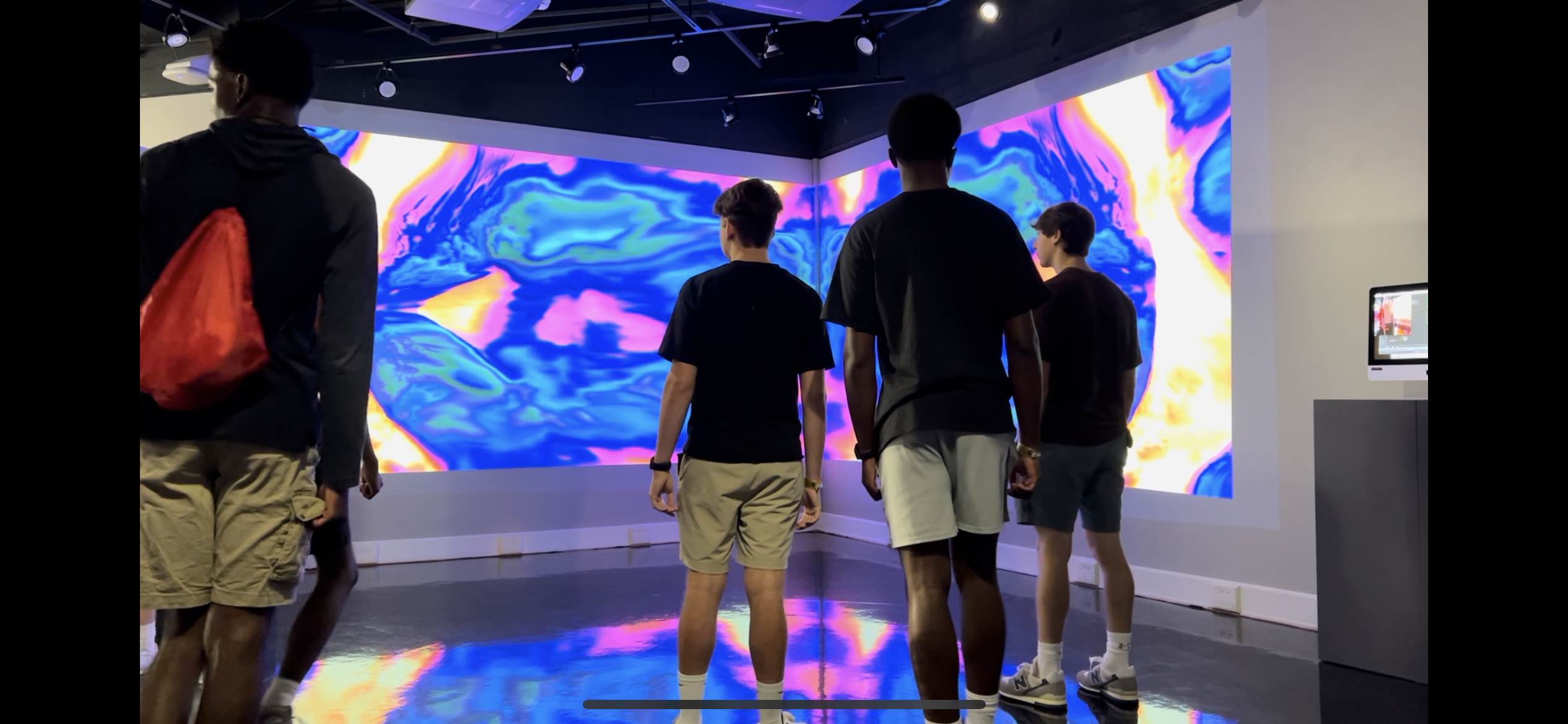 Students engage with In Motion in the Ringel Gallery.