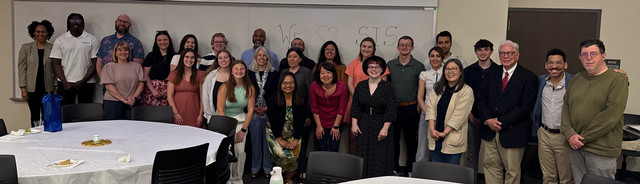 Photo of students, professors and families at the SIS Award Ceremony 2025