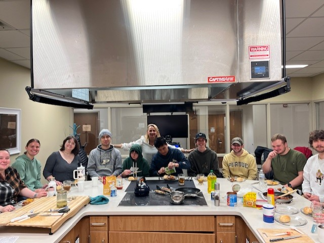 Students and Instructor in World Foods and Cultures Cooking Lab