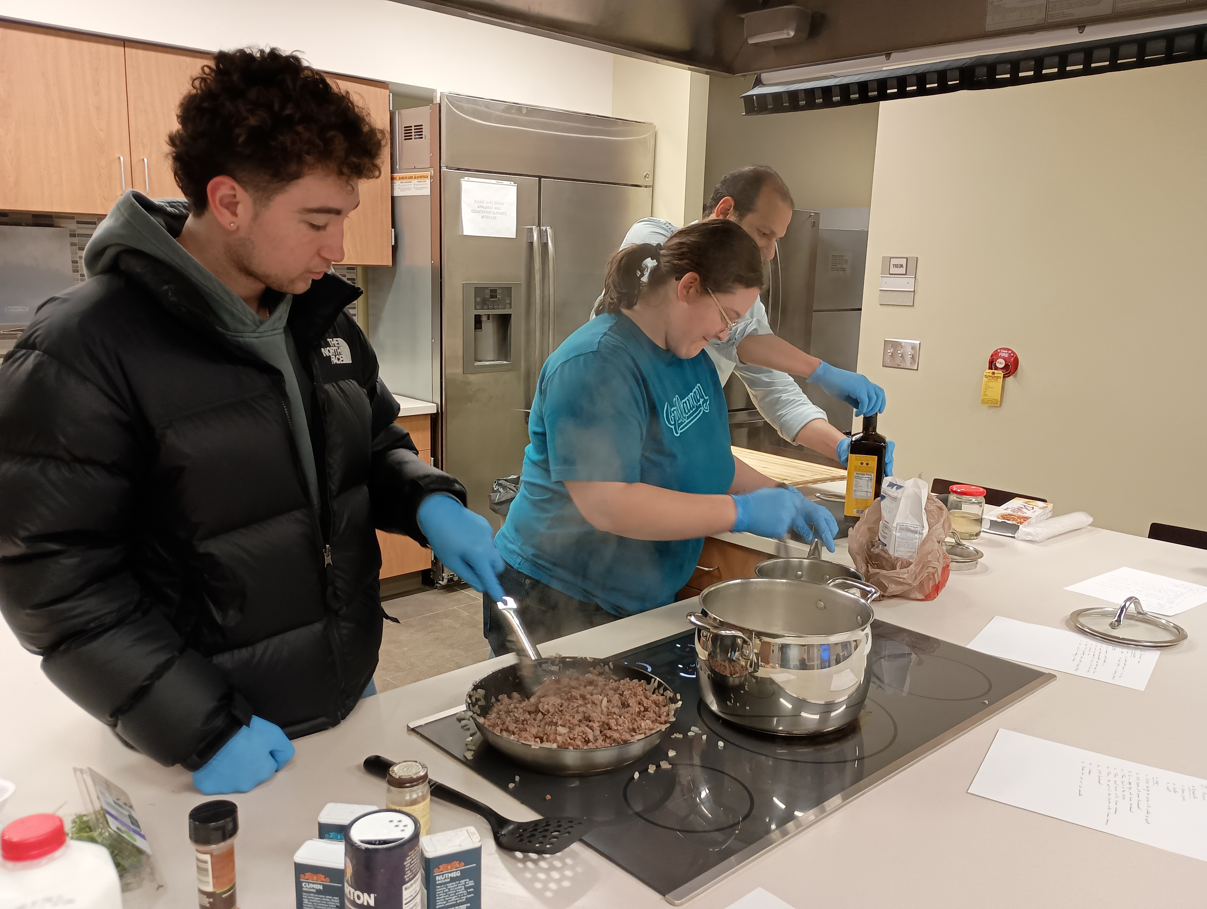 Students Cooking in Middle Eastern Foods and Cultures Cooking Class 