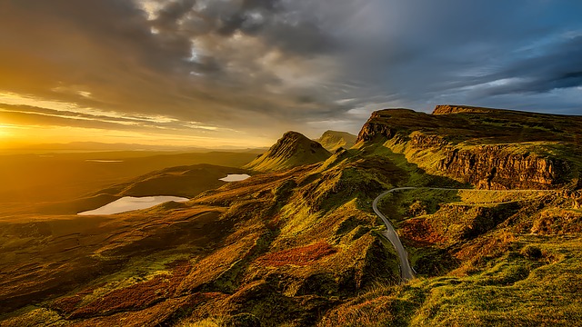 panoramic shot of hills and mountain in Scotland at sunset