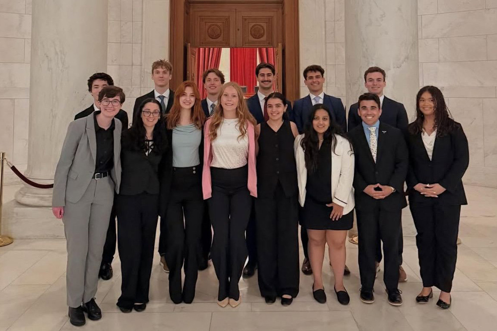 A group of students pose for a photo in the U.S. Capital.