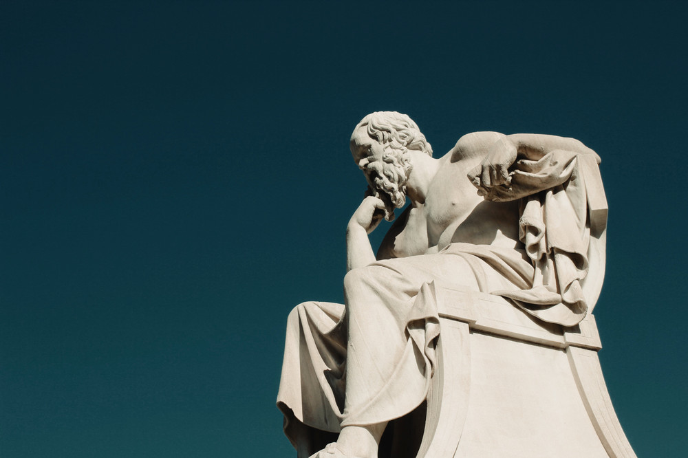 Statue of a man thinking
